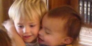 Children-hugging-300×238