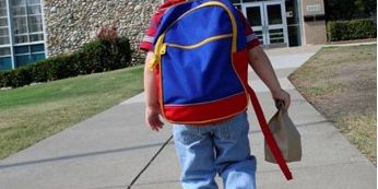 boy_walking_to_school_346x316